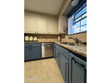 Beautifully updated 4 bedroom home is walking distance to the on Castlewoods Golf Club in Mississippi - for sale on GolfHomes.com, golf home, golf lot