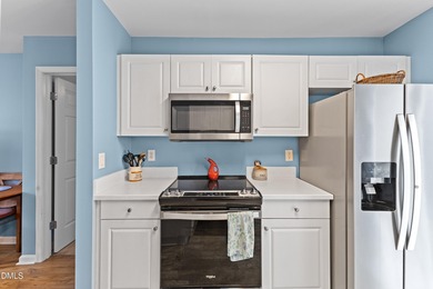 Welcome to this charming one-bedroom end-unit townhome nestled on Hedingham Golf and Athletic Club in North Carolina - for sale on GolfHomes.com, golf home, golf lot