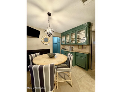 Beautifully updated 4 bedroom home is walking distance to the on Castlewoods Golf Club in Mississippi - for sale on GolfHomes.com, golf home, golf lot