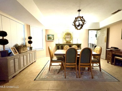 Beautifully updated 4 bedroom home is walking distance to the on Castlewoods Golf Club in Mississippi - for sale on GolfHomes.com, golf home, golf lot