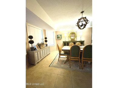Beautifully updated 4 bedroom home is walking distance to the on Castlewoods Golf Club in Mississippi - for sale on GolfHomes.com, golf home, golf lot
