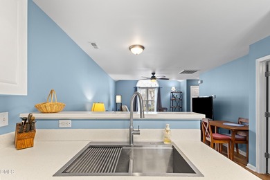 Welcome to this charming one-bedroom end-unit townhome nestled on Hedingham Golf and Athletic Club in North Carolina - for sale on GolfHomes.com, golf home, golf lot