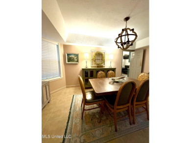 Beautifully updated 4 bedroom home is walking distance to the on Castlewoods Golf Club in Mississippi - for sale on GolfHomes.com, golf home, golf lot