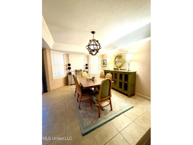 Beautifully updated 4 bedroom home is walking distance to the on Castlewoods Golf Club in Mississippi - for sale on GolfHomes.com, golf home, golf lot