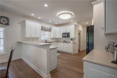 Enjoy maintenance-free living in this beautiful townhome located on The Club At Porto Cima in Missouri - for sale on GolfHomes.com, golf home, golf lot