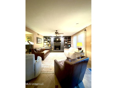 Beautifully updated 4 bedroom home is walking distance to the on Castlewoods Golf Club in Mississippi - for sale on GolfHomes.com, golf home, golf lot