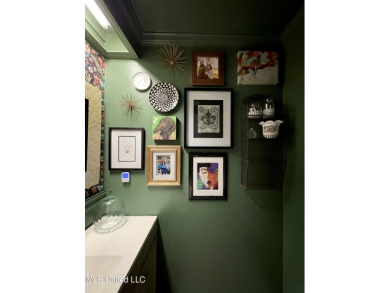 Beautifully updated 4 bedroom home is walking distance to the on Castlewoods Golf Club in Mississippi - for sale on GolfHomes.com, golf home, golf lot