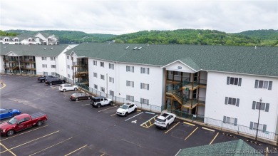 Ready for Lake Life? This exceptional 4 bed, 2 bath penthouse on The Club At Old Kinderhook in Missouri - for sale on GolfHomes.com, golf home, golf lot