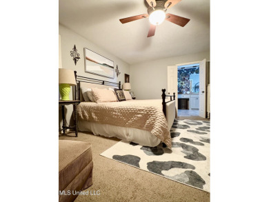 Beautifully updated 4 bedroom home is walking distance to the on Castlewoods Golf Club in Mississippi - for sale on GolfHomes.com, golf home, golf lot