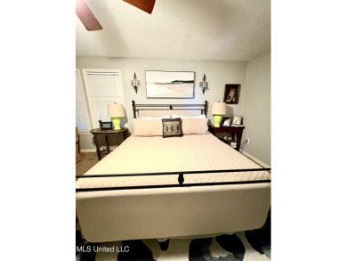 Beautifully updated 4 bedroom home is walking distance to the on Castlewoods Golf Club in Mississippi - for sale on GolfHomes.com, golf home, golf lot