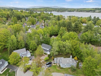 Welcome to lake life at its finest in the private, gated on Laconia Country Club in New Hampshire - for sale on GolfHomes.com, golf home, golf lot