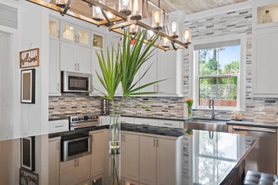 Residing in the resort-inspired community of The Retreat at on Seascape Golf Course in Florida - for sale on GolfHomes.com, golf home, golf lot