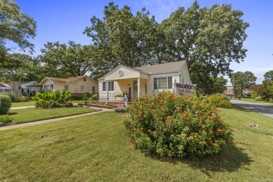 Nestled on a well-maintained corner lot, this charming bungalow on The Greens At North Hills Country Club in Arkansas - for sale on GolfHomes.com, golf home, golf lot