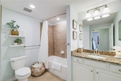 GOLF MEMBERSHIP INLCUDED! This First Floor Coach Home offers a on Bonita National Golf Course in Florida - for sale on GolfHomes.com, golf home, golf lot