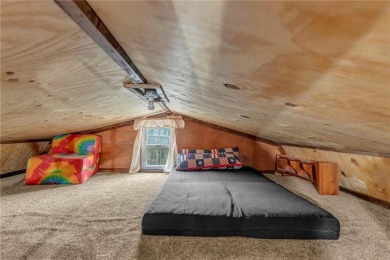 Enjoy lakeside living with this charming and move-in ready cabin on Sugar Valley Lakes Golf Course in Kansas - for sale on GolfHomes.com, golf home, golf lot