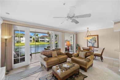 Nicely appointed first floor coach home located directly across on Windstar on Naples Bay in Florida - for sale on GolfHomes.com, golf home, golf lot