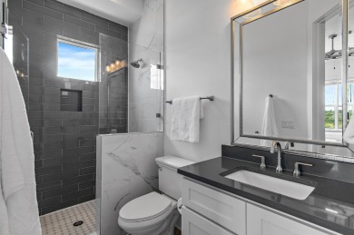 Residing in the resort-inspired community of The Retreat at on Seascape Golf Course in Florida - for sale on GolfHomes.com, golf home, golf lot