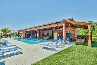 Residing in the resort-inspired community of The Retreat at on Seascape Golf Course in Florida - for sale on GolfHomes.com, golf home, golf lot