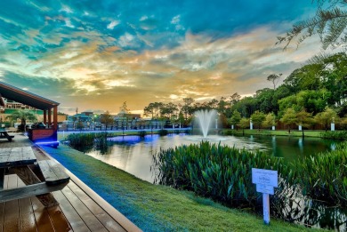 Residing in the resort-inspired community of The Retreat at on Seascape Golf Course in Florida - for sale on GolfHomes.com, golf home, golf lot
