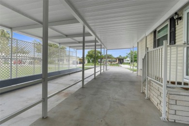 IMPRESSIVE, REMODELED, and UPGRADED HOME with CARPORT...AND...RV on Brookridge Country Club in Florida - for sale on GolfHomes.com, golf home, golf lot