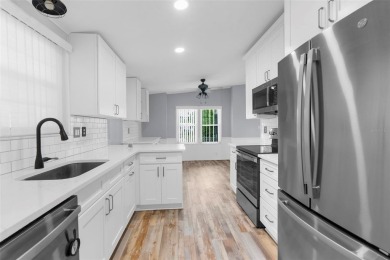 IMPRESSIVE, REMODELED, and UPGRADED HOME with CARPORT...AND...RV on Brookridge Country Club in Florida - for sale on GolfHomes.com, golf home, golf lot