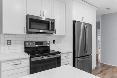 IMPRESSIVE, REMODELED, and UPGRADED HOME with CARPORT...AND...RV on Brookridge Country Club in Florida - for sale on GolfHomes.com, golf home, golf lot
