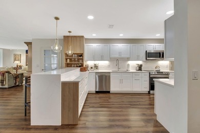 Step into luxury with this expanded first-floor Eastgate condo on Hunters Run Golf and Country Club in Florida - for sale on GolfHomes.com, golf home, golf lot