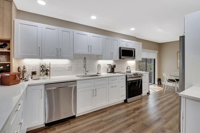 Step into luxury with this expanded first-floor Eastgate condo on Hunters Run Golf and Country Club in Florida - for sale on GolfHomes.com, golf home, golf lot