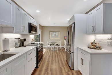 Step into luxury with this expanded first-floor Eastgate condo on Hunters Run Golf and Country Club in Florida - for sale on GolfHomes.com, golf home, golf lot