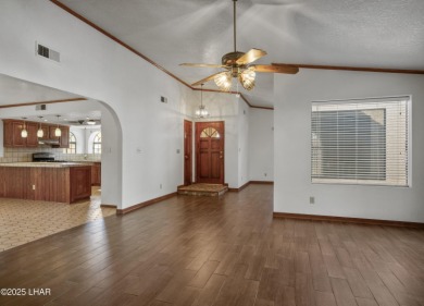 Welcome to a home filled with laughter, warmth, and on Chaparral Golf and Country Club in Arizona - for sale on GolfHomes.com, golf home, golf lot