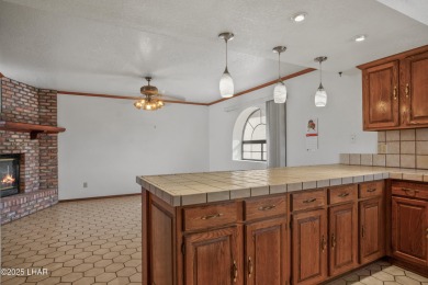 Welcome to a home filled with laughter, warmth, and on Chaparral Golf and Country Club in Arizona - for sale on GolfHomes.com, golf home, golf lot