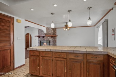 Welcome to a home filled with laughter, warmth, and on Chaparral Golf and Country Club in Arizona - for sale on GolfHomes.com, golf home, golf lot