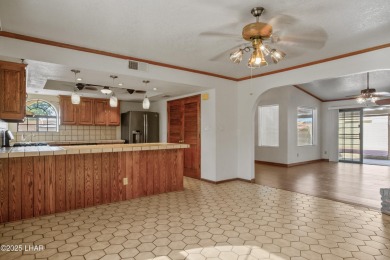 Welcome to a home filled with laughter, warmth, and on Chaparral Golf and Country Club in Arizona - for sale on GolfHomes.com, golf home, golf lot