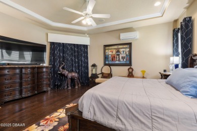 Luxurious 4-Bedroom Pool Home in Prestigious Plantation Bay's on Plantation Bay Golf and Country Club in Florida - for sale on GolfHomes.com, golf home, golf lot