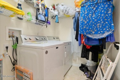 This charming attached villa, is located in the Award Winning on LPGA International Golf Course in Florida - for sale on GolfHomes.com, golf home, golf lot