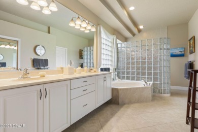 Luxurious 4-Bedroom Pool Home in Prestigious Plantation Bay's on Plantation Bay Golf and Country Club in Florida - for sale on GolfHomes.com, golf home, golf lot