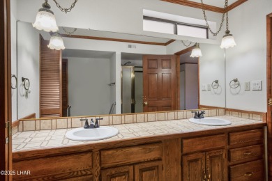 Welcome to a home filled with laughter, warmth, and on Chaparral Golf and Country Club in Arizona - for sale on GolfHomes.com, golf home, golf lot