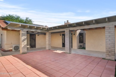 Welcome to a home filled with laughter, warmth, and on Chaparral Golf and Country Club in Arizona - for sale on GolfHomes.com, golf home, golf lot