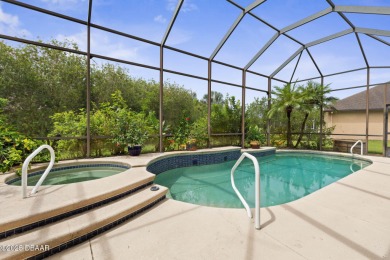 Luxurious 4-Bedroom Pool Home in Prestigious Plantation Bay's on Plantation Bay Golf and Country Club in Florida - for sale on GolfHomes.com, golf home, golf lot