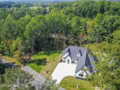 Discover your dream home at 182 Oostanali Way, Loudon, TN on Toqua Golf Course - Loudon County in Tennessee - for sale on GolfHomes.com, golf home, golf lot