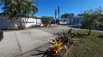 PAVED RV LOT IN ACTIVE 55+ COMMUNITY! Property could have a on River Run Golf Links in Florida - for sale on GolfHomes.com, golf home, golf lot