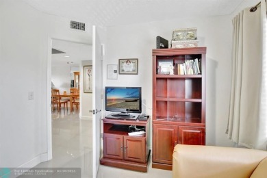 Enjoy the spectacular LAKE view from this beautiful 2/2 located on Flamingo Lakes Country Club in Florida - for sale on GolfHomes.com, golf home, golf lot