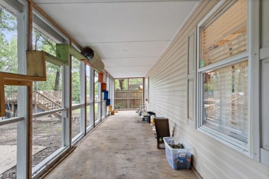 Discover this charming 2-bedroom, 2-bath retreat nestled under a on Links At Lands End in Texas - for sale on GolfHomes.com, golf home, golf lot