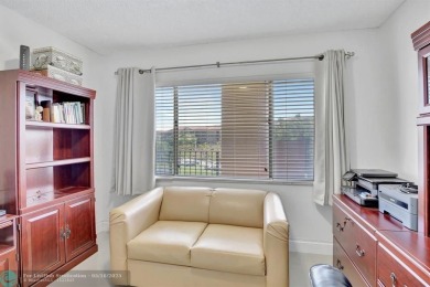 Enjoy the spectacular LAKE view from this beautiful 2/2 located on Flamingo Lakes Country Club in Florida - for sale on GolfHomes.com, golf home, golf lot