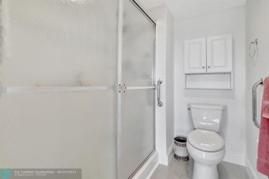 Enjoy the spectacular LAKE view from this beautiful 2/2 located on Flamingo Lakes Country Club in Florida - for sale on GolfHomes.com, golf home, golf lot