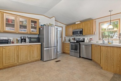 Discover this charming 2-bedroom, 2-bath retreat nestled under a on Links At Lands End in Texas - for sale on GolfHomes.com, golf home, golf lot
