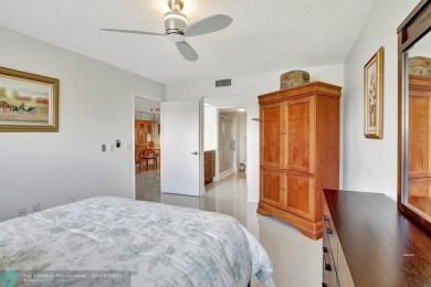 Enjoy the spectacular LAKE view from this beautiful 2/2 located on Flamingo Lakes Country Club in Florida - for sale on GolfHomes.com, golf home, golf lot
