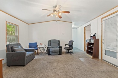 Discover this charming 2-bedroom, 2-bath retreat nestled under a on Links At Lands End in Texas - for sale on GolfHomes.com, golf home, golf lot