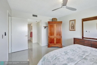 Enjoy the spectacular LAKE view from this beautiful 2/2 located on Flamingo Lakes Country Club in Florida - for sale on GolfHomes.com, golf home, golf lot