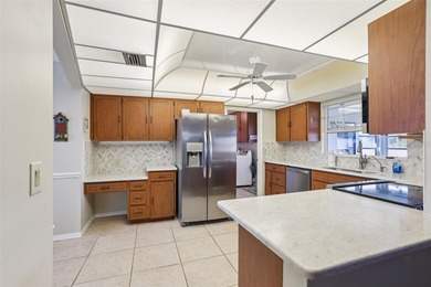 Welcome to your fully furnished Florida retreat in the highly on Sandpiper Golf Club in Florida - for sale on GolfHomes.com, golf home, golf lot